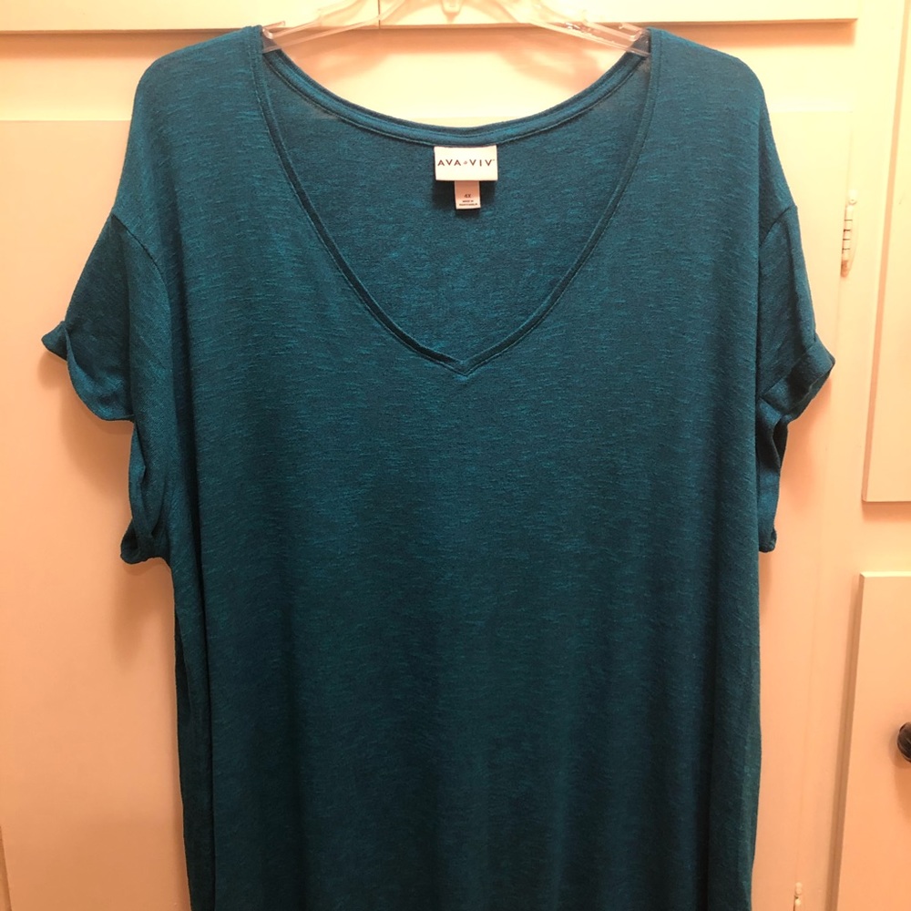 Comfy teal short sleeved blouse.